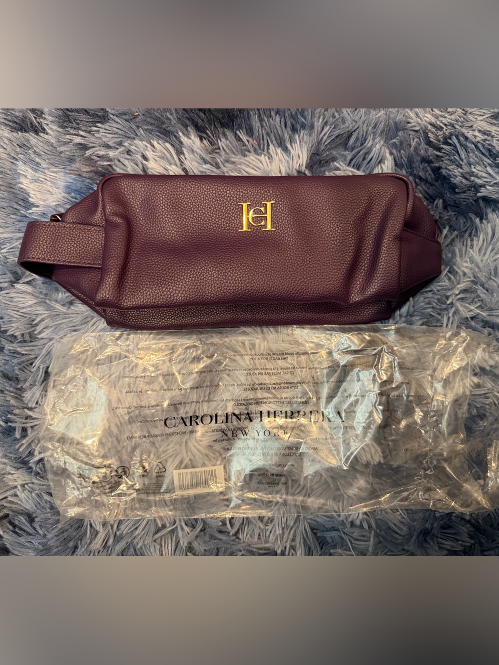 Carolina Herrera Plum Pebbled Leather Toiletry Case with Gold CH Logo